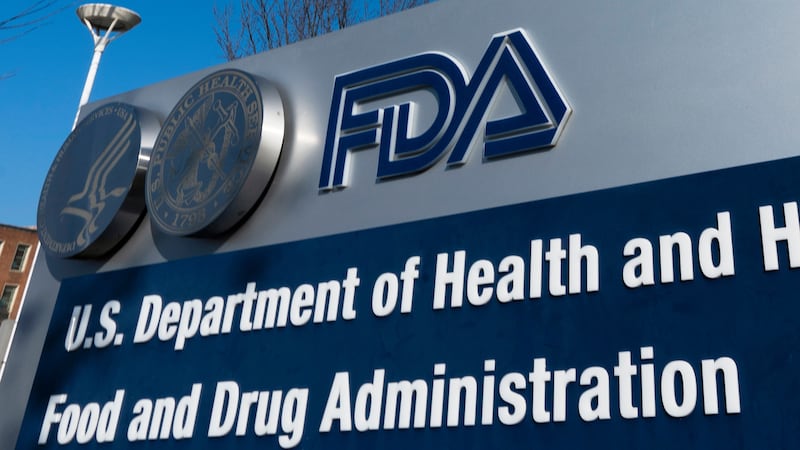 FILE - A sign for the U.S. Food and Drug Administration is displayed outside their offices in...