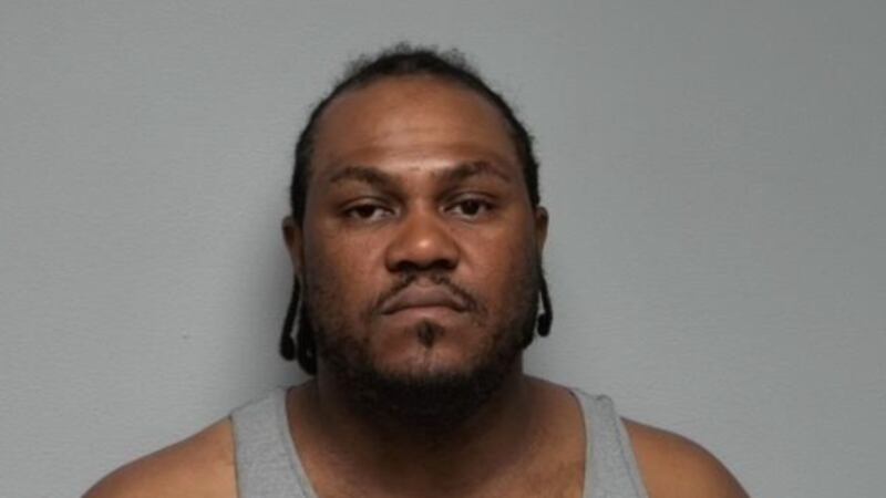 Lewis J. Boyd, de 44 años, fue acusado y encarcelado por tener un arma de fuego que había sido...