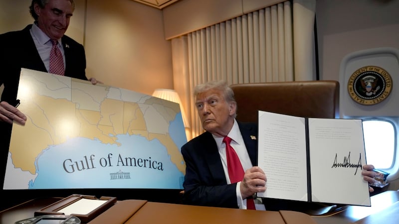 President Donald Trump holds up a signed proclamation declaring Feb. 9 Gulf of America Day, as...