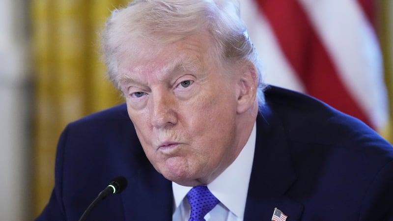 President Donald Trump attends a meeting with oil executives in the East Room of the White...